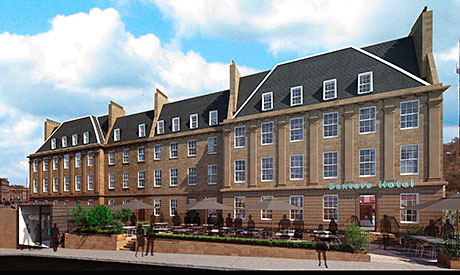 A developer has won planning permission to transform a row of Edinburgh townhouses into a hotel.