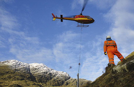 Difficult terrain meant that barrier installation, handled by specialist contractor Geo-rope, was undertaken with the help of a helicopter.