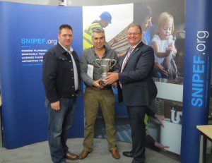 The David A More Trophy winner Ian Flockhart (m) from SNIPEF Heating Scotland Ltd with Robin Hall (L) and Robert Beagley (R)