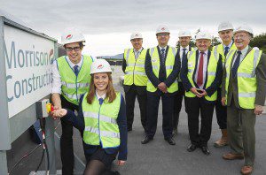 Inverness Royal Academy topping out ceremony. Turning the switch on inflating the ETFE Polimer plastic roof over the main atrium are Head boy Marlon Hall and head girl Samantha Fraser with LtoR Gordon Piper (Dept Head Teacher), Robin Fyfe (Acting Head Teacher), hub North Scotland Ltd Chief Exec Angus MacFarlane, Cllr Drew Millar, Donald Mclachan, Morrison Construction and Cllr Norrie Donald.