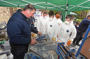 015_NFRC Scottish Trade Member, Rooftec (Scotland) Ltd demonstrating slate cutting to schoolchildren in Falkirk as part of the Scottish Apprenticeship Week 2015