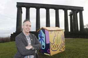 Pic Greg Macvean - 02/12/2015 - 07971 826 457 Adrian is pictured by his shed Hanneke Scott-van Wel Architect and Director of Stone Opera helps some children from Royal Mile Primary School put the final touches on a garden shed, pimped-up by artist Adrian Wiszniewski to mark the launch of the Festival of Architecture 2016 today (2nd Dec).  The Festival will run across the length and breadth of Scotland next year with 400 events, exhibitions and activities for all ages.  The headline events announced today include The Ideal Hut Show, Hinterland (St. Peter's Kilmahew), Adventures in Space and Scotstyle.  Stone Opera will be curating the community engagement programme.  Go to www.foa2016.com to find out more. Press enquiries to jude@flourishmarketing.co.uk / 07739 791 792