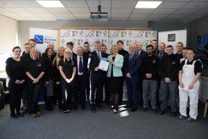 Investors in Young People gold award for City Building.  The commitment by Glasgow contractor City Building to both fair work and training was highlighted today. Cabinet Secretary for Fair Work, Skills and Training Roseanna Cunningham presented the firm with their gold Investors in Young People award for a strong track record in developing their young workforce.  Picture shows Cabinet Secretary with Trainees  3/02/16  (Photo by Kirsty Anderson/Herald & Times) - KA