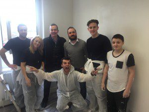 Ryan Wilson (QS), Jennifer Breaden (Assistant Planner), Jim Ward ( BAM Construction Director), Robin Wallace (Y People), Ross Gunning (Trainee Site Manager), Alex and Carl (bending down) are two young people staying in the shelter. 
