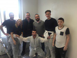Ryan Wilson (QS), Jennifer Breaden (Assistant Planner), Jim Ward ( BAM Construction Director), Robin Wallace (Y People), Ross Gunning (Trainee Site Manager), Alex and Carl (bending down) are two young people staying in the shelter.