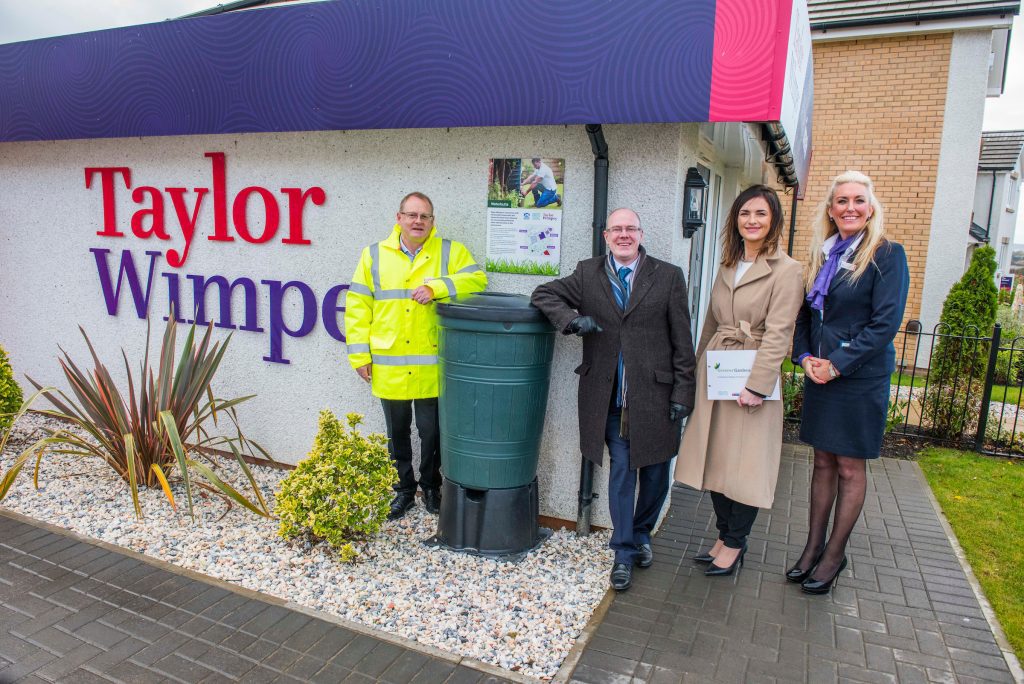 (L-R) Minister for Local Government and Housing, Kevin Stewart with Willie Burns MD, Audrey Ross and Angela Curran of Taylor Wimpey West Scotland