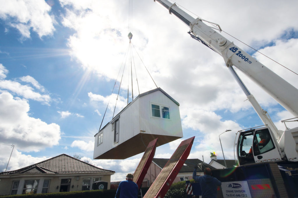 A Wee House being slotted into place in Paisley