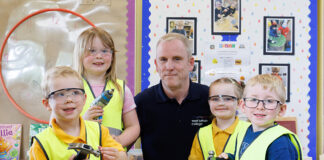 Graeme with pupils at Stoneyburn Primary School. Image credit: Robert Perry