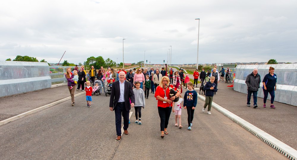 Community celebrating bridge opening