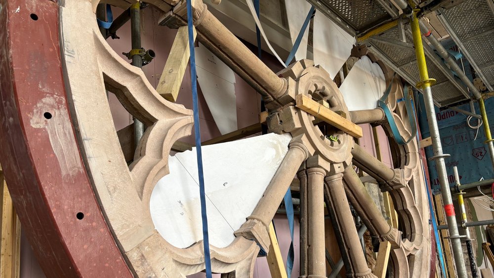 Rose window being restored