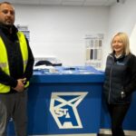 St Andrews’ Christine Crawford, assistant branch manager at Livingston, with Mohamed Abotaleb of HSS