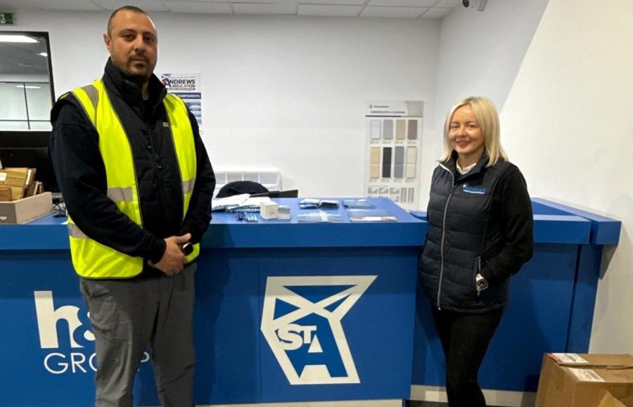 St Andrews’ Christine Crawford, assistant branch manager at Livingston, with Mohamed Abotaleb of HSS