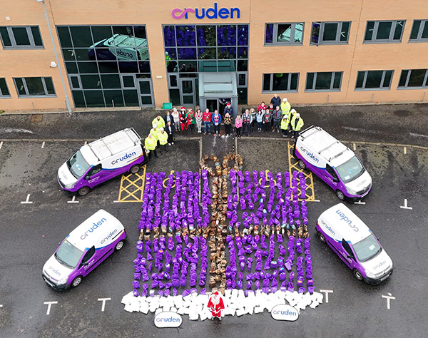 Cruden staff members with 6 tonnes of food supplies donated in 2024