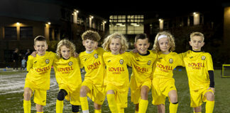 Lovell Homes donates kits to Hamilton youth football team