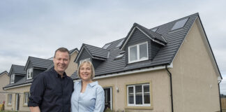 Barbara and partner John with their David Wilson Homes property