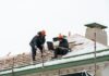 Roofers in winter. Image credit: Shutterstock