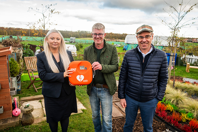 Taylor Wimpey sales executive Dana Reynolds with John West (Winchburgh Growing Group) and Pierre Puyrigaud (development manager for Winchburgh Developments Ltd). Image credit: Chris Watt