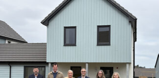 Albyn senior leadership and Angus MacDonald MP visit one of the homes in Broadford, Isle of Skye