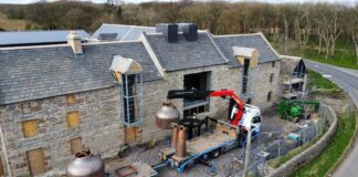 Stills being lifted at Castletown Mill
