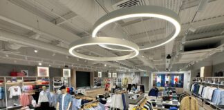 Lacoste clothing store featuring T shirts and other garments