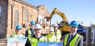 Demolitom work is underway on the former Sharks Mouth pub in Coatbridge