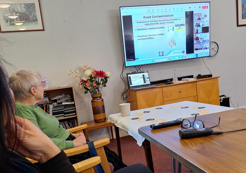 Sheltered housing tenant watching smart TV