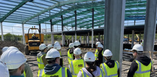 College students visiting construction project