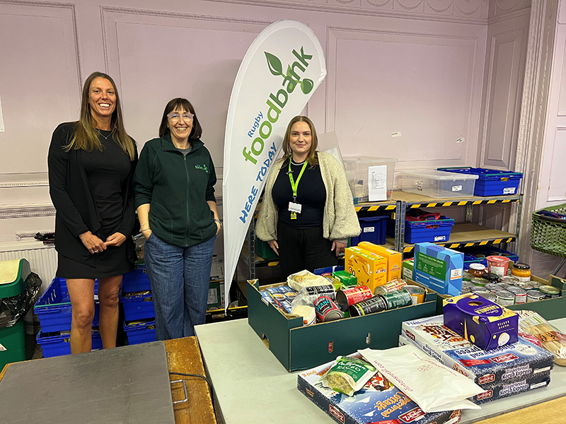 PERI employees with foodbank donations