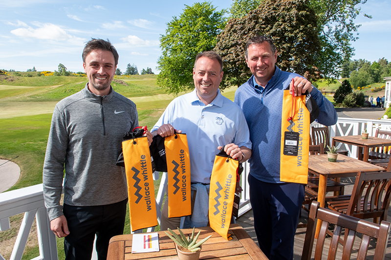 Golfers at charity event