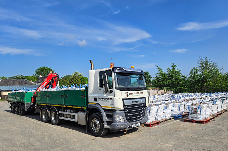 Lorry transporting construction products