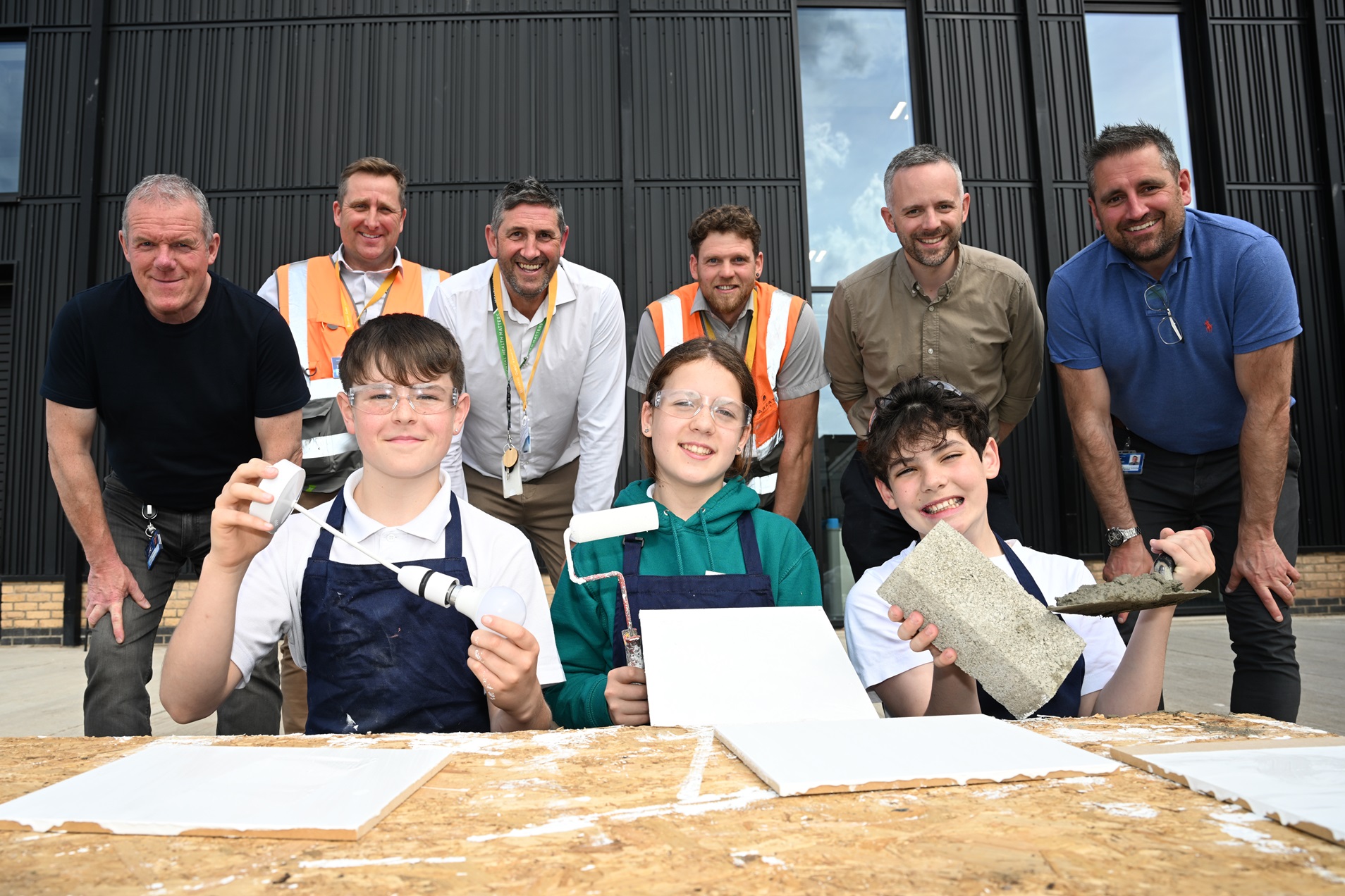 Barratt staff with school pupils