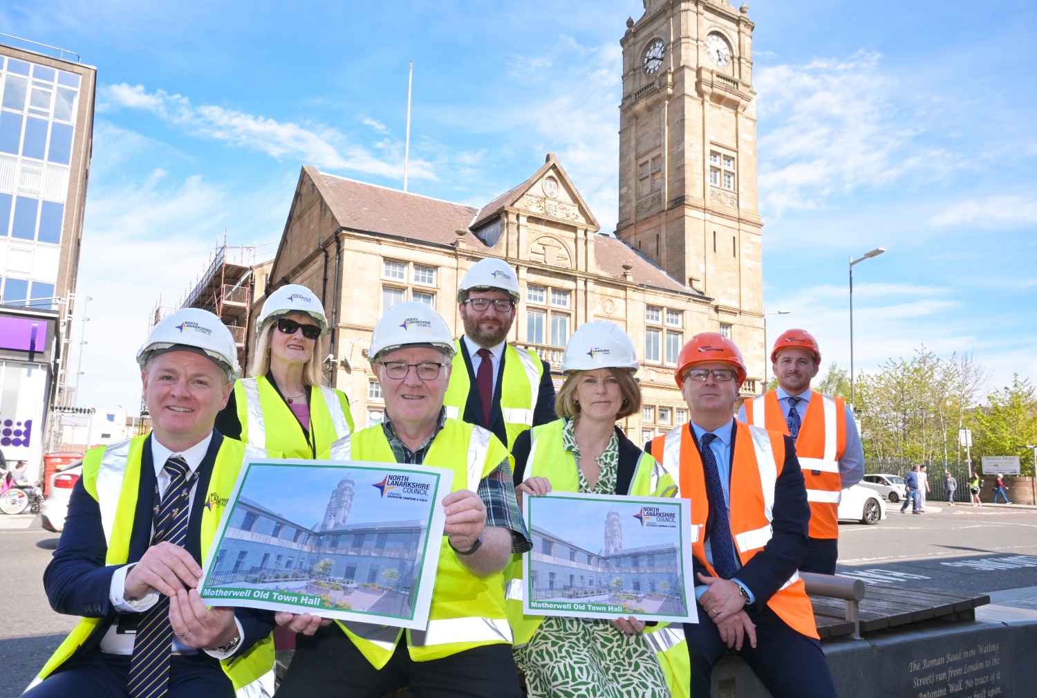Project team outside of Motherwell Town Hall alongside revamp plans
