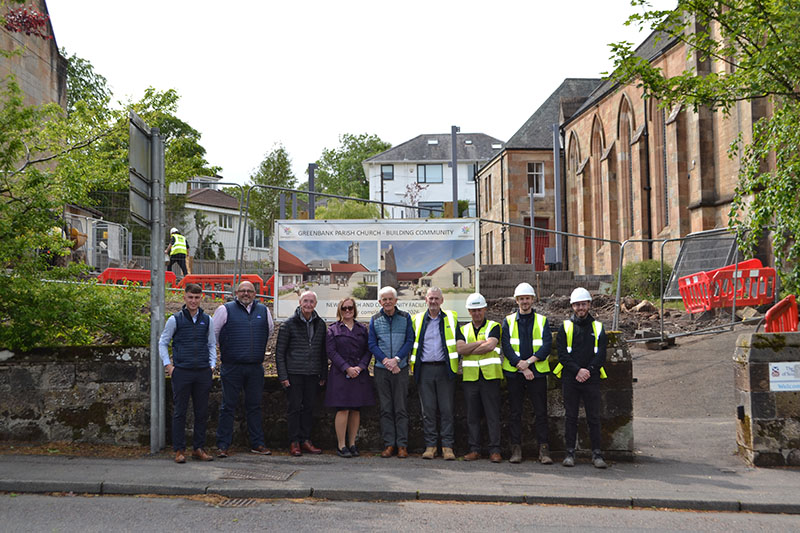 Construction workers at site of church extension