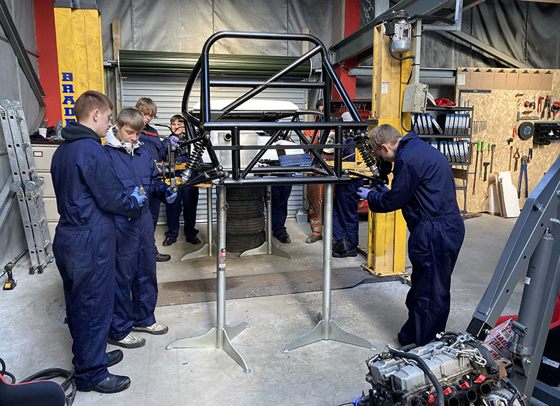 Youngsters learning construction skills