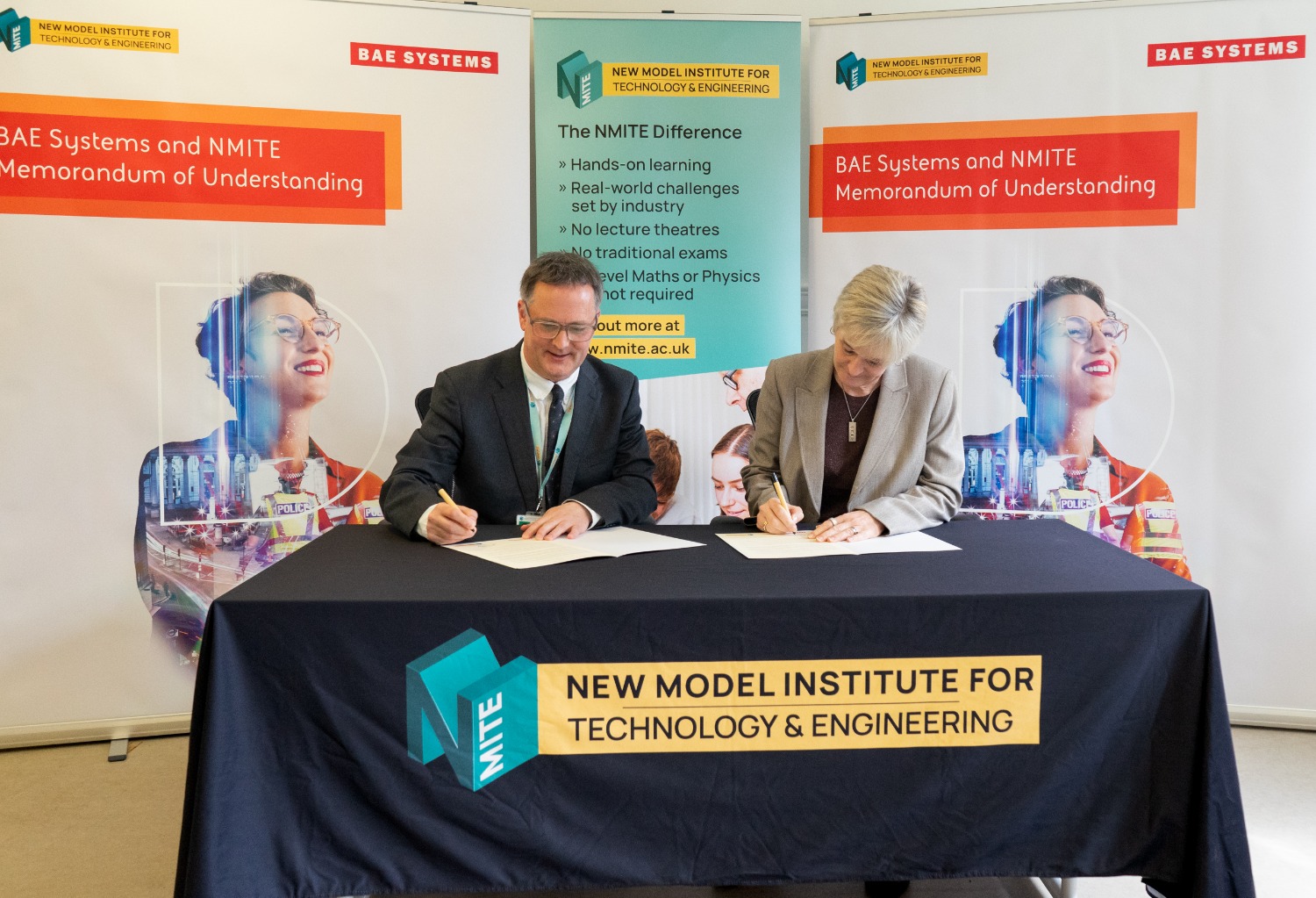 Andrea Thompson, Group Managing Director at BAE Systems Digital Intelligence and James Newby, President and CEO of NMITE, signing the MoU