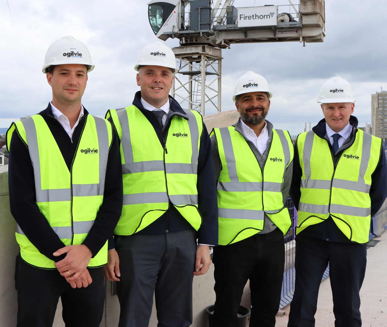 Construction workers at PBSA topping out ceremony