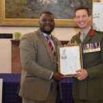 Robertson Veteran and Assistant Site Manager Shadrech collected the Armed Forces Covenant Silver Award.jpg