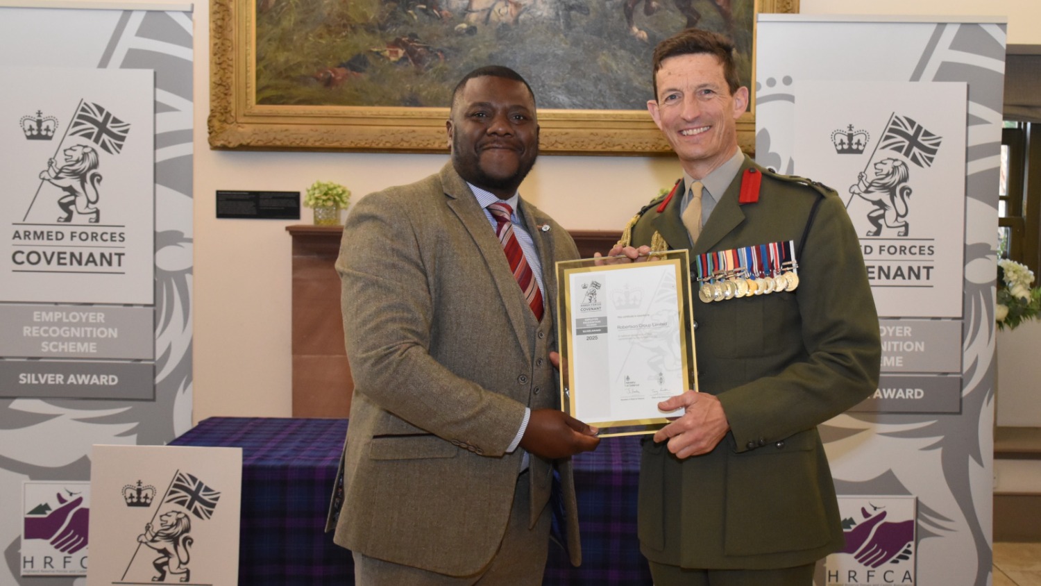 Robertson Veteran and Assistant Site Manager Shadrech collected the Armed Forces Covenant Silver Award.jpg