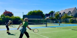 Players enjoying the new courts at Juniper Green