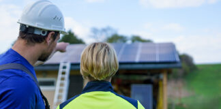 Male and female solar installers