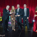 Dunfermline practice wins top architect accolade Architecture practice on stage accepting award