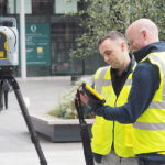 Consultancy launches new geospatial measurement service Construction workers carrying out geospatial measurement work