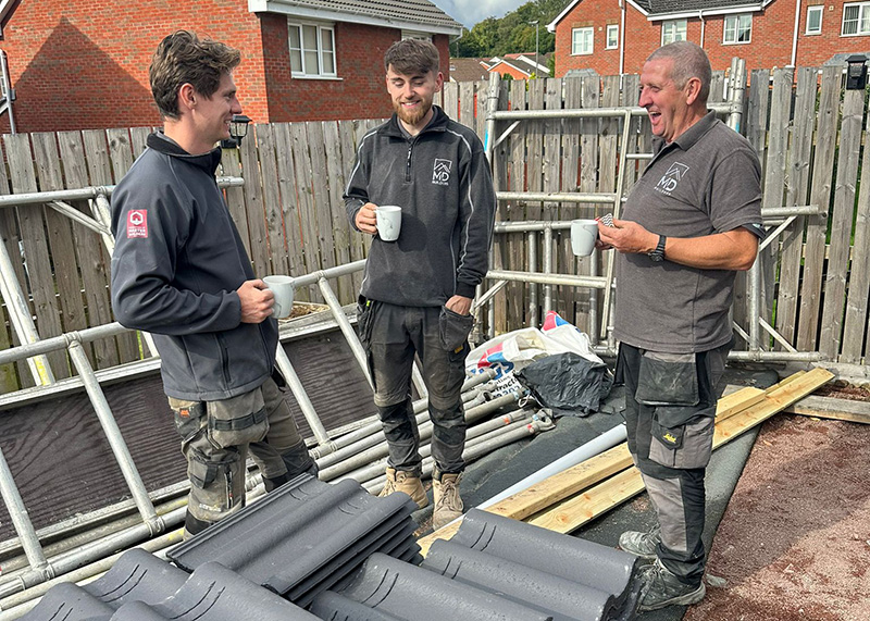 (L-R) Martin Daly with his employees John and James