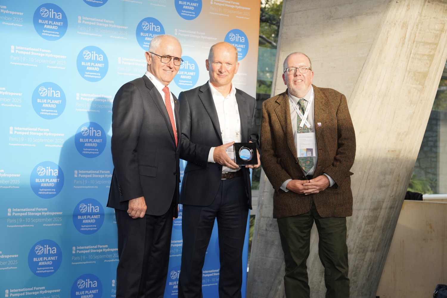(From left) Malcolm Turnbull, President of IHA and former Australian Prime Minister, presents the IHA Blue Planet Prize 2025 for Pumped Storage to SSE’s Mike Seaton, Project Director of the proposed Coire Glas Hydropower Project, with Sean Kelly, former Coire Glas Project Manager. Pic credit: IHA