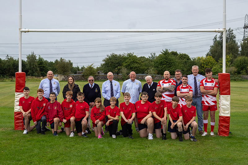 Rugby players celebrate Allanwater partnership
