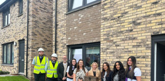 Group photo at new housing development in Glasgow
