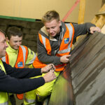 Investing in young people pays off for Forster Group Construction workers on roofing project