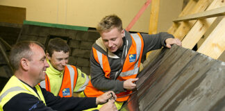 Construction workers on roofing project