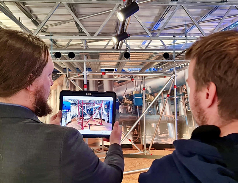 Workers using digital scaffolding app