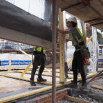 Better cooperation on offsite construction tipped to boost affordable housing delivery Prefabricated wooden trusses being installed on site